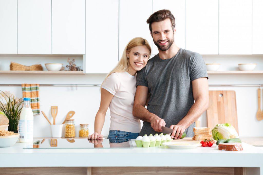 Married young couple enjoying their time at home
