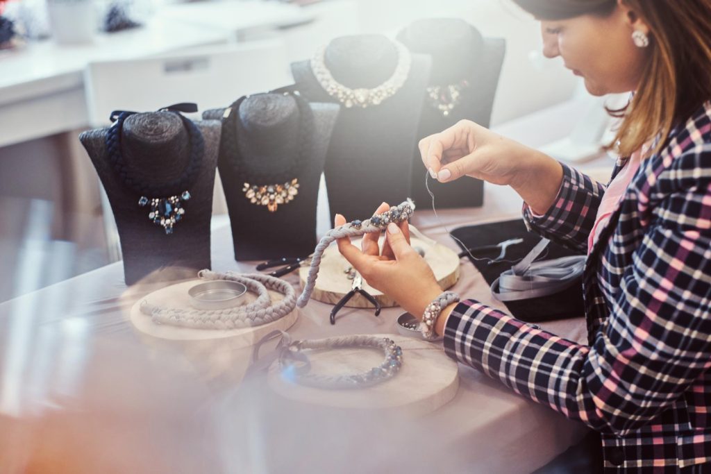 woman makes handmade diamond jewellery necklaces