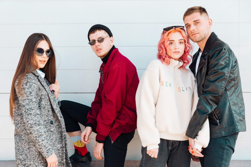 Teenagers posing in trendy spring clothes
